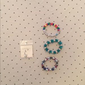 DONATED!! Three stretchy bracelets and an arrow earring